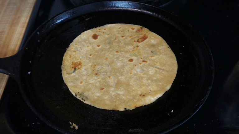 cooking aloo paratha
